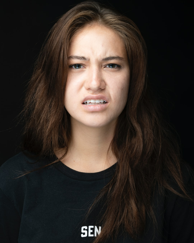 Disgust Expression: A No-Go in Passport Photos